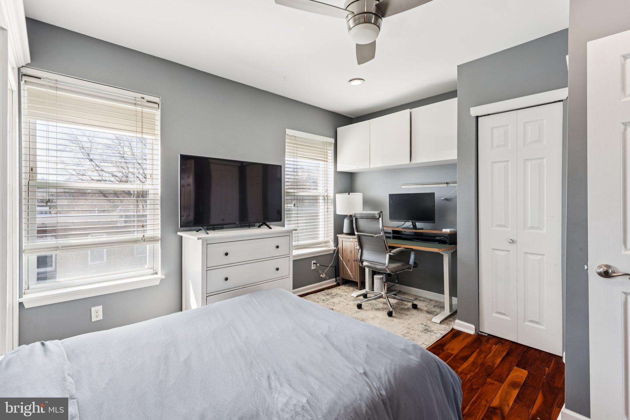 3005 Poplar Street Philadelphia, PA 19130 - Photo 35 of 53 a bedroom with a bed and a flat screen tv