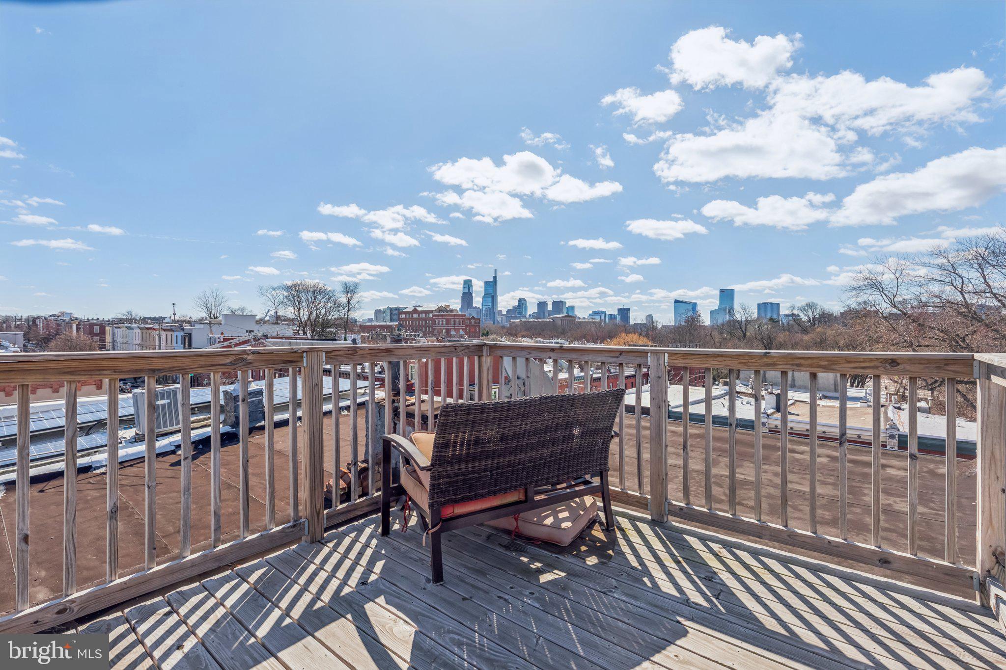 3005 Poplar Street Philadelphia, PA 19130 - Photo 40 of 53 a view of a balcony with wooden benches