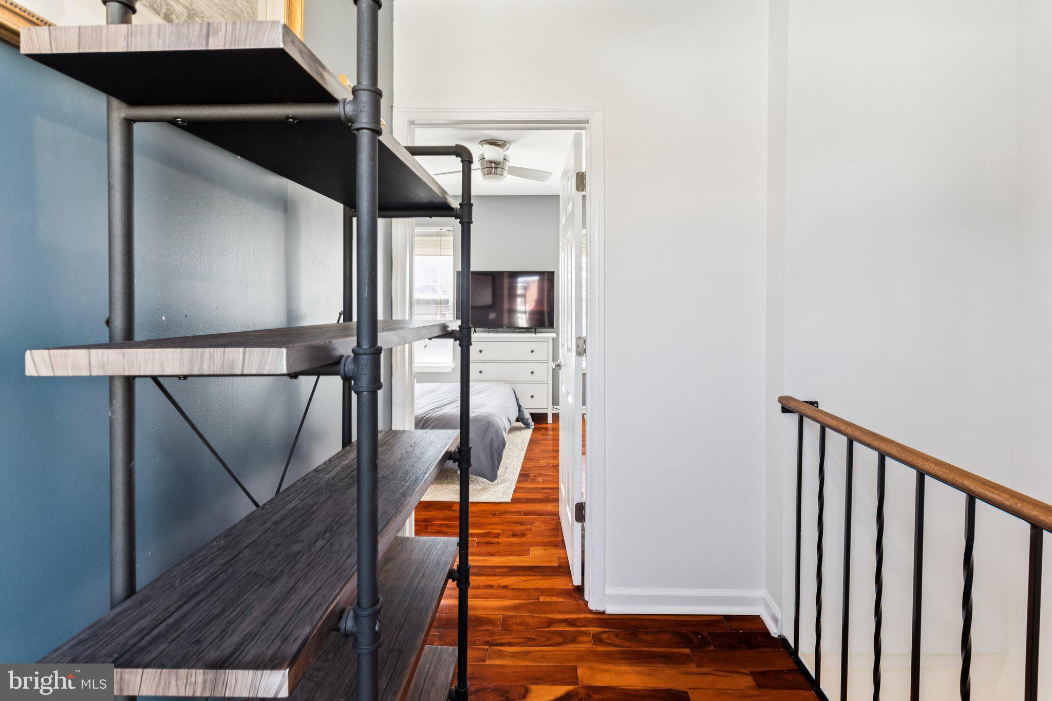 3005 Poplar Street Philadelphia, PA 19130 - Photo 42 of 53 a view of entryway and hall with wooden floor