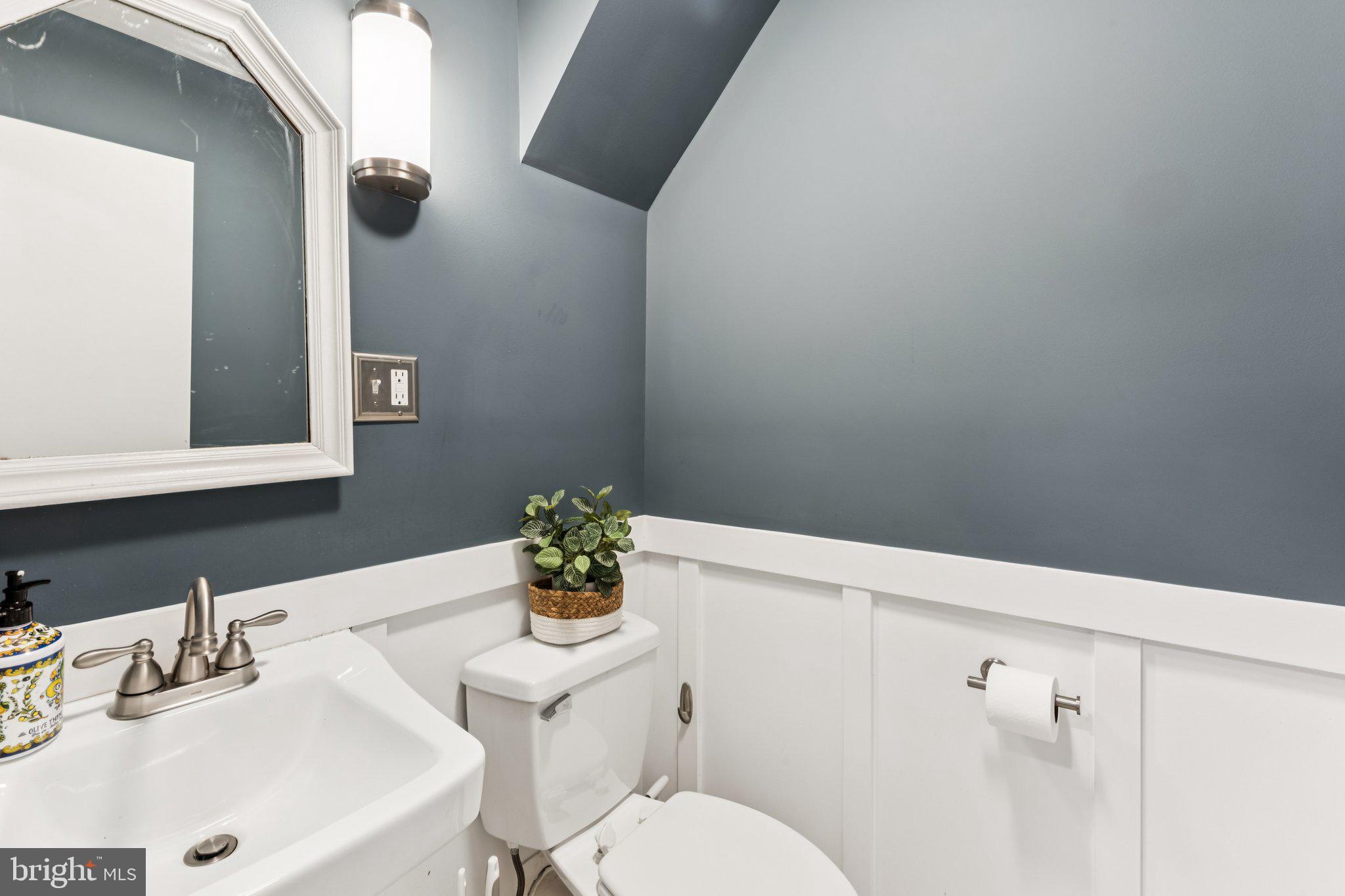 3005 Poplar Street Philadelphia, PA 19130 - Photo 45 of 53 a bathroom with a sink and a toilet