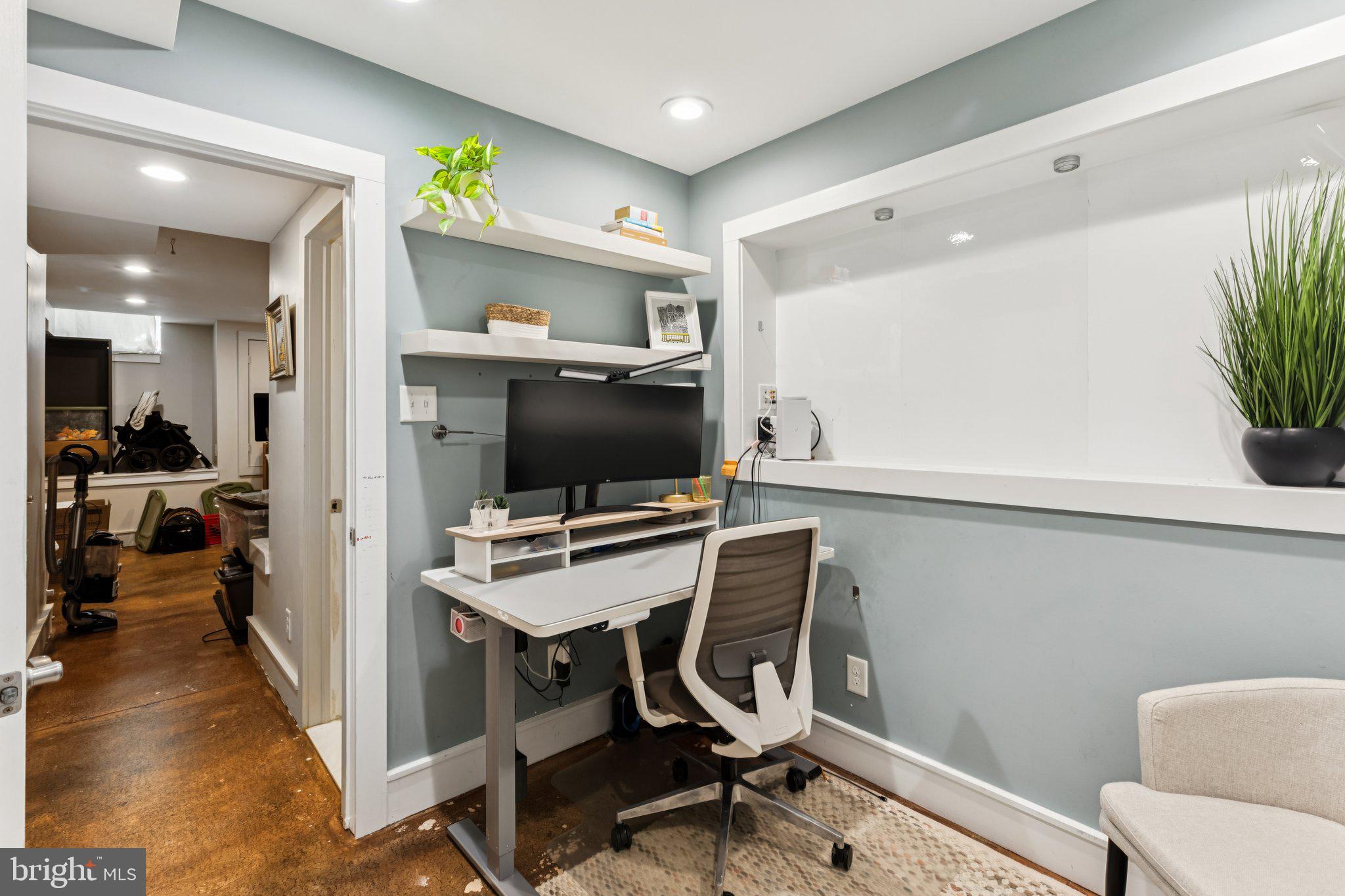 3005 Poplar Street Philadelphia, PA 19130 - Photo 46 of 53 a workspace with furniture and a flat screen tv