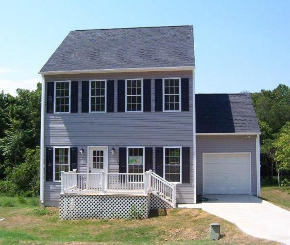 2914 Green Ridge Road Northwest Roanoke, VA 24019 - Photo 1 of 23 a front view of a house with a yard