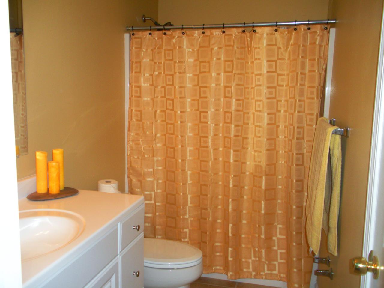 2914 Green Ridge Road Northwest Roanoke, VA 24019 - Photo 14 of 23 a bathroom with a sink a toilet and shower curtain