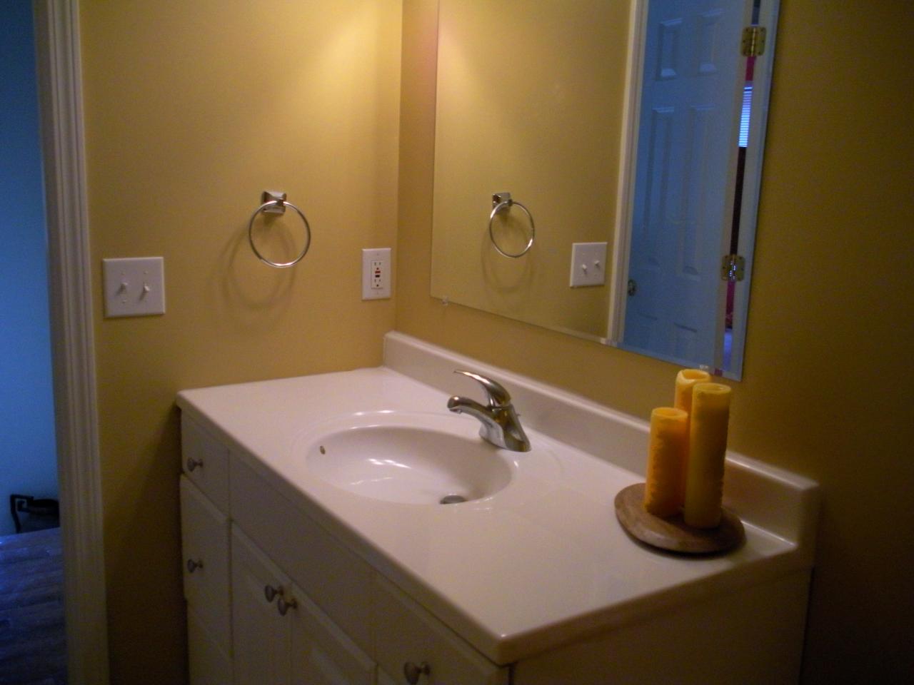 2914 Green Ridge Road Northwest Roanoke, VA 24019 - Photo 15 of 23 a bathroom with a sink and a mirror
