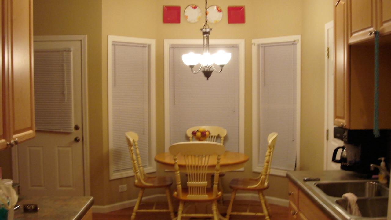 2914 Green Ridge Road Northwest Roanoke, VA 24019 - Photo 8 of 23 a view of a dining room with furniture and chandelier