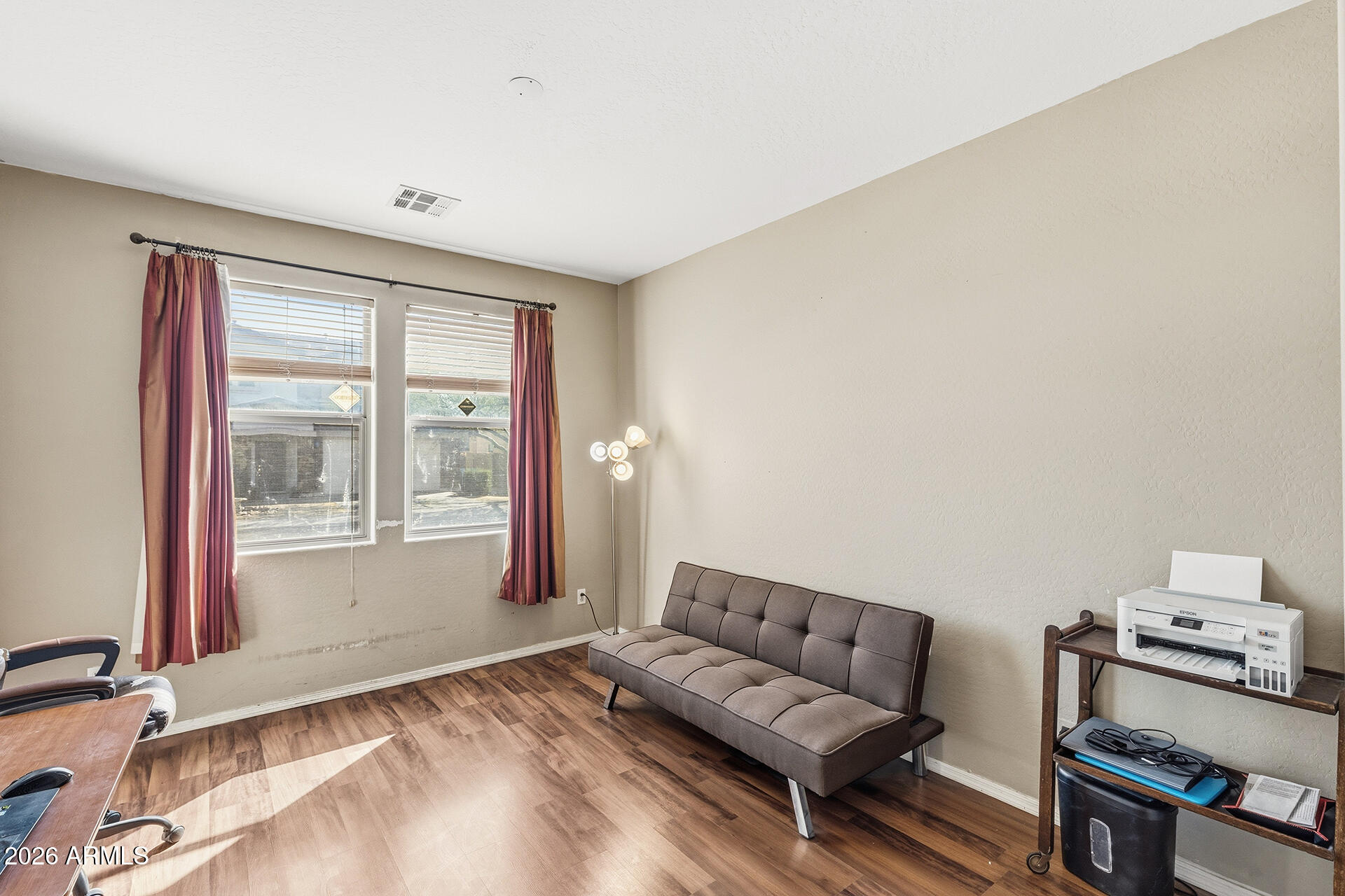 6718 West Darrel Road Laveen, AZ 85339 - Photo 23 of 49 a living room with furniture and a window