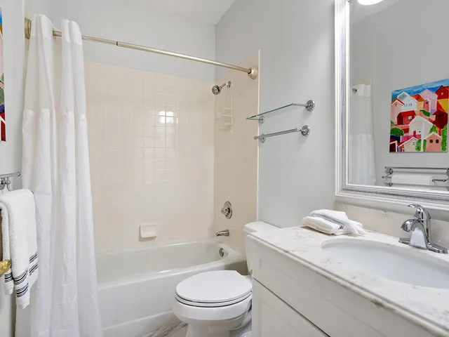 a bedroom with a bed furniture and a window