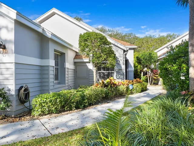a view of a room with door and entryway