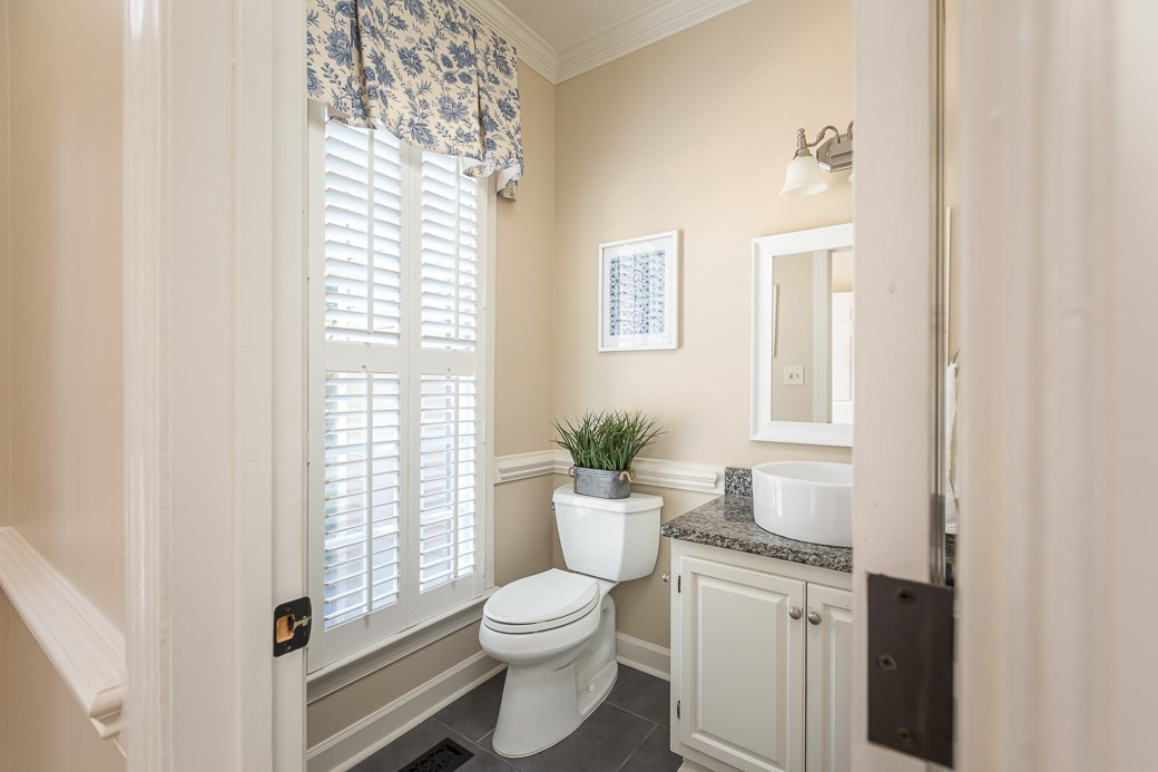 6120 Friars Walk Place Raleigh, NC 27609 - Photo 7 of 21 Half bathroom on the first floor provides easy access for guests and family. HALF BATHROOM