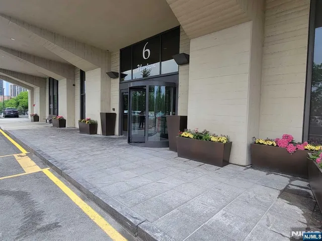 a view of an outdoor space and tennis court