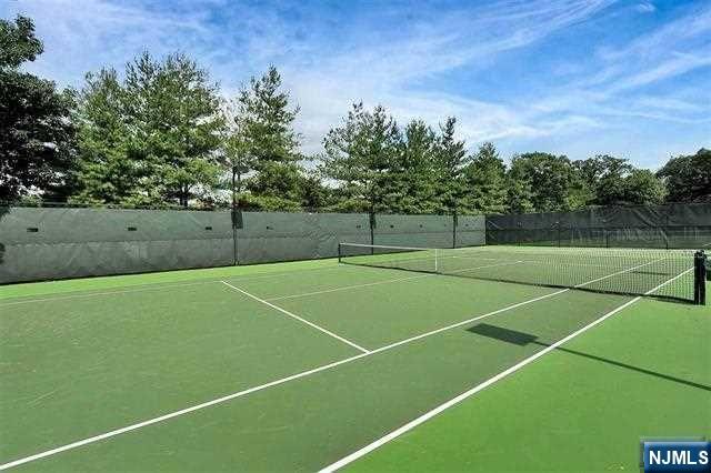6 Horizon Road, Unit 310 Fort Lee, NJ 07024 - Photo 34 of 35 a view of an outdoor space and tennis court