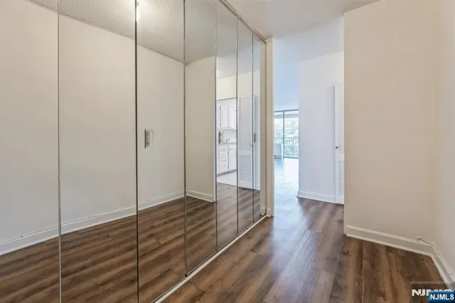 a view of a bathroom with a sink and shower curtain