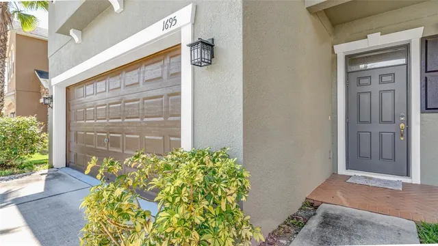 front view of a house with a door and a window