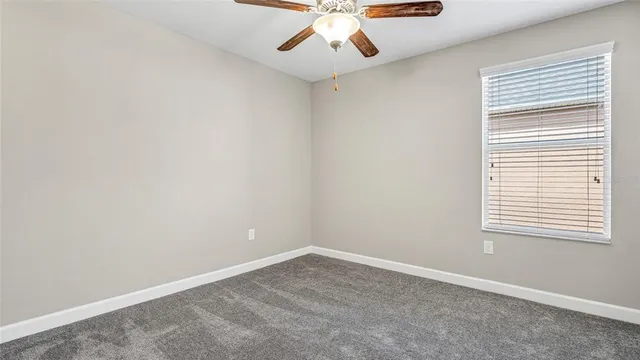 a view of a storage & utility room with window