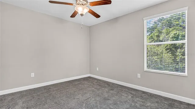 a view of an empty room and storage