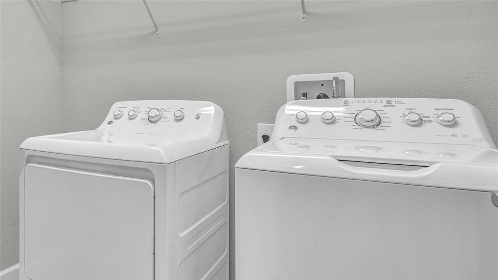 1695 Ludington Avenue Wesley Chapel, FL 33543 - Photo 40 of 65 a utility room with dryer and washer