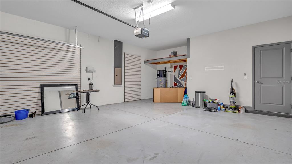 1695 Ludington Avenue Wesley Chapel, FL 33543 - Photo 42 of 65 a view of a livingroom with furniture and a ceiling fan