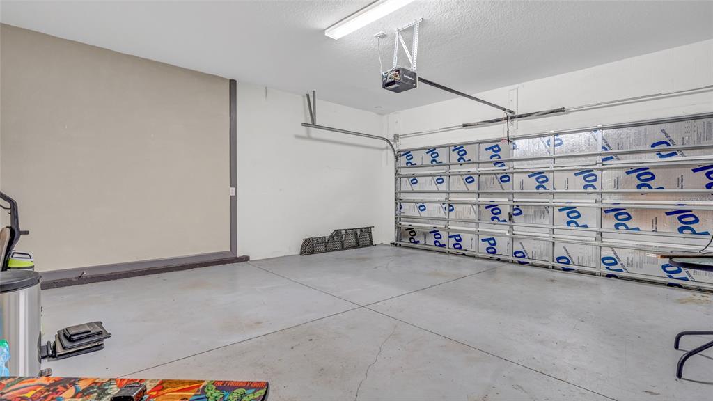 1695 Ludington Avenue Wesley Chapel, FL 33543 - Photo 43 of 65 a view of an empty room and storage