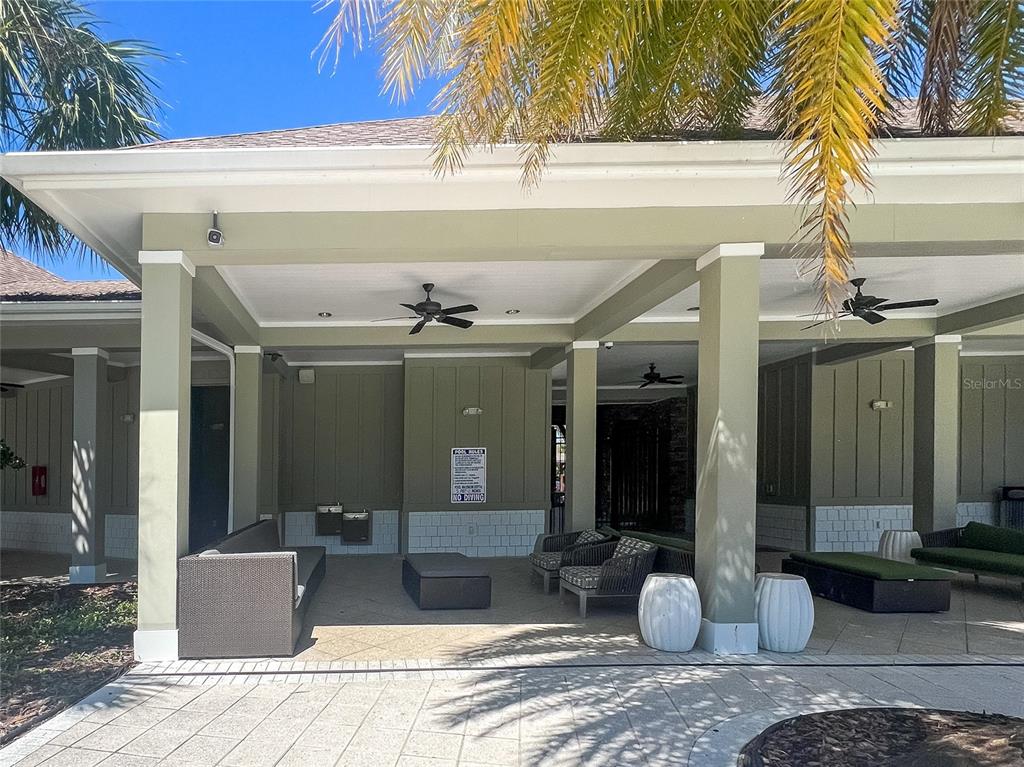 1695 Ludington Avenue Wesley Chapel, FL 33543 - Photo 61 of 65 a view of a house with a patio