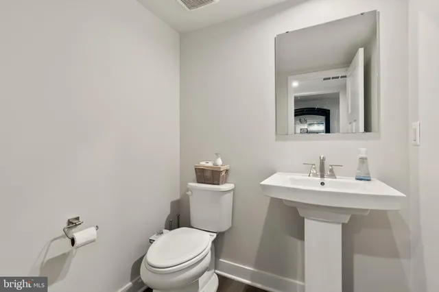 a bathroom with a shower and a toilet