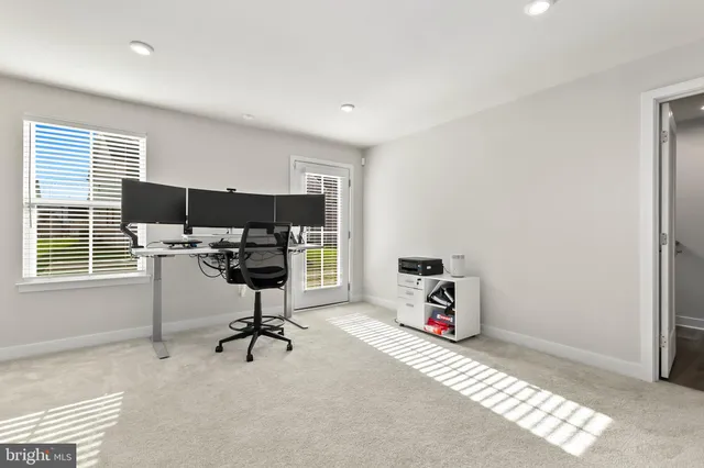 a room with furniture and a flat screen tv