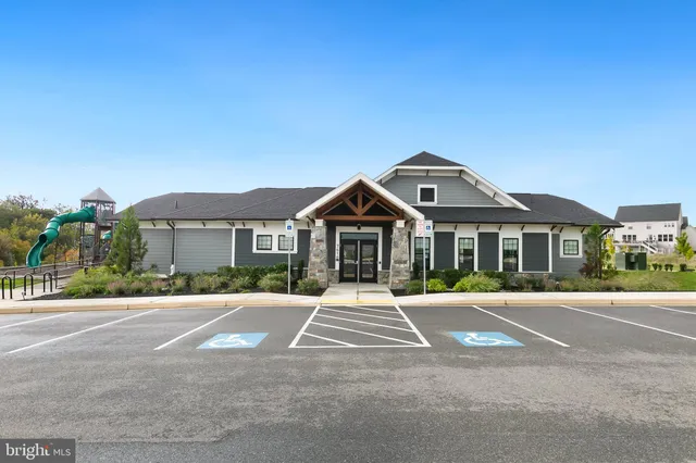 a view of a park with iron fence