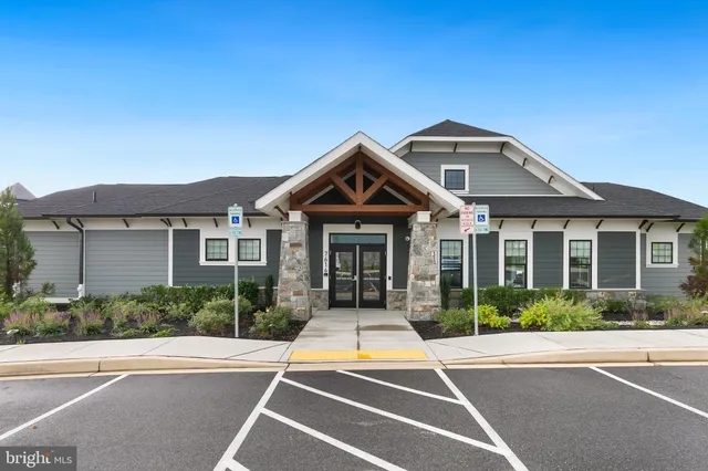 a view of a wooden house with a park