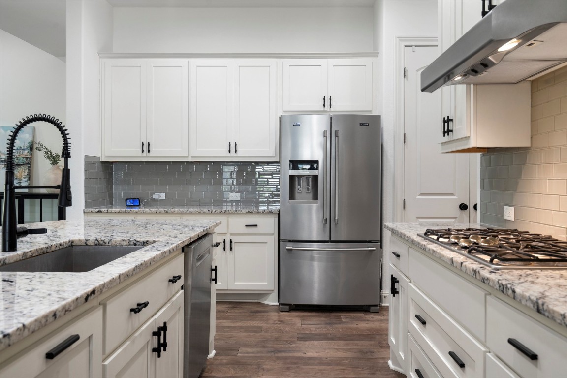 Beautiful kitchen. White cabinets with granite.