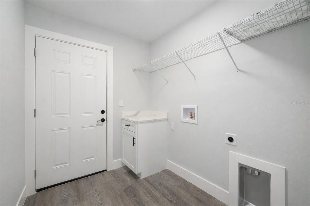 3244 Southeast 147th Lane Summerfield, FL 34491 - Photo 22 of 25 a view of empty room with wooden floor