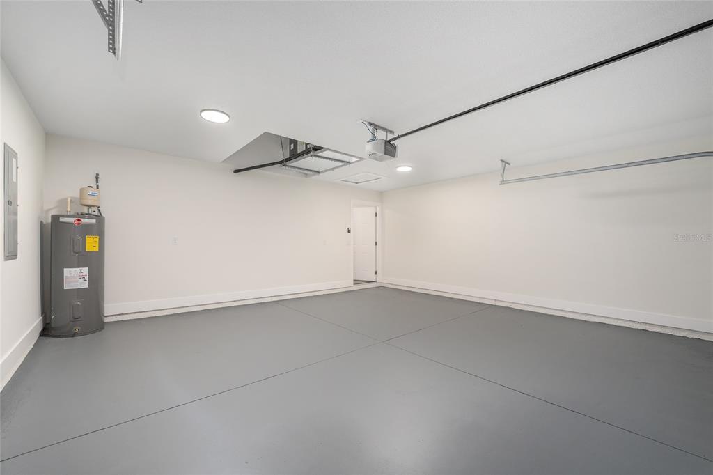 3244 Southeast 147th Lane Summerfield, FL 34491 - Photo 24 of 25 an empty room with ceiling fan and windows