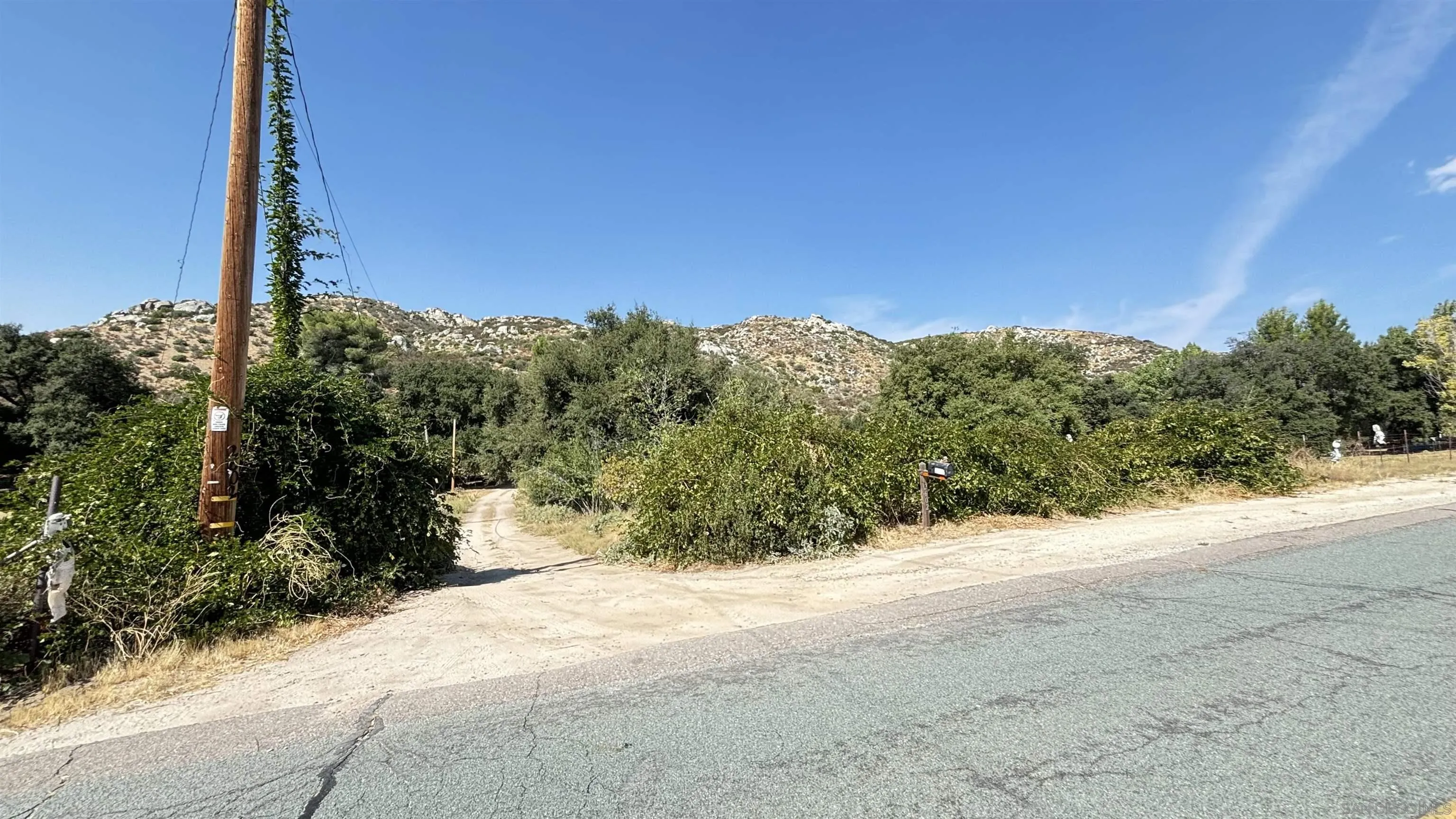 2602 La Posta Road Campo, CA 91906 - Photo 3 of 16 a view of a road with a yard