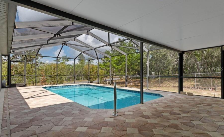 12411 Convent Garden Road Brooksville, FL 34613 - Photo 24 of 49 a view of a backyard