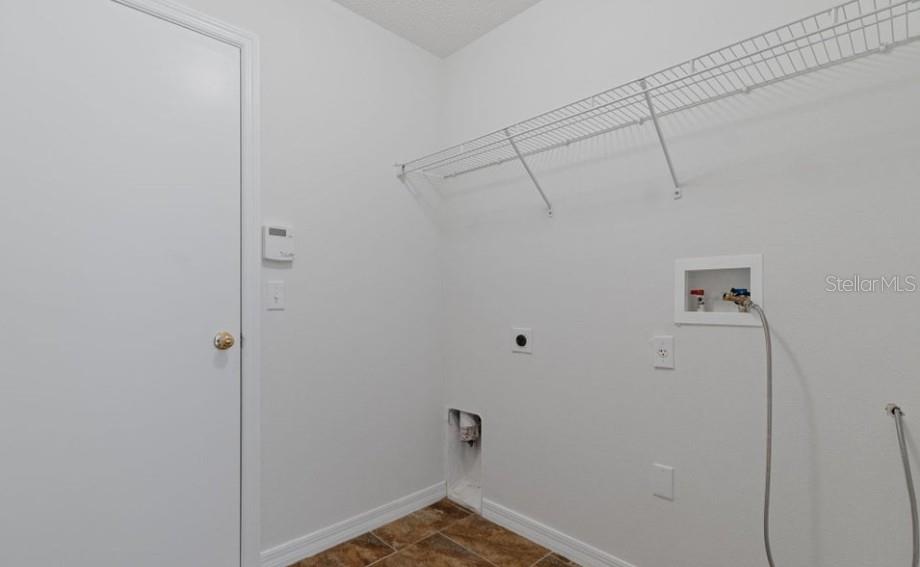 12411 Convent Garden Road Brooksville, FL 34613 - Photo 38 of 49 a view of a room with closet