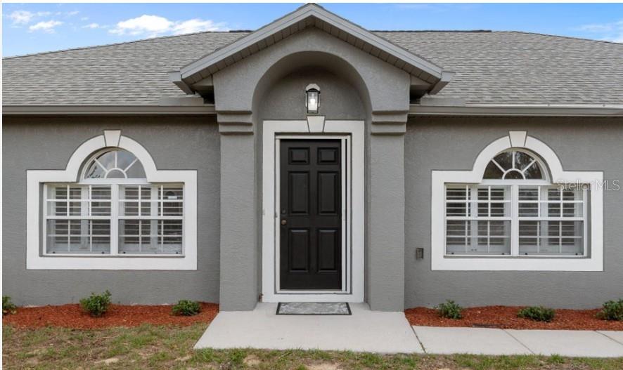 12411 Convent Garden Road Brooksville, FL 34613 - Photo 47 of 49 a front view of a house