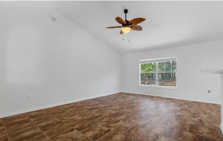 12411 Convent Garden Road Brooksville, FL 34613 - Photo 9 of 49 an empty room
