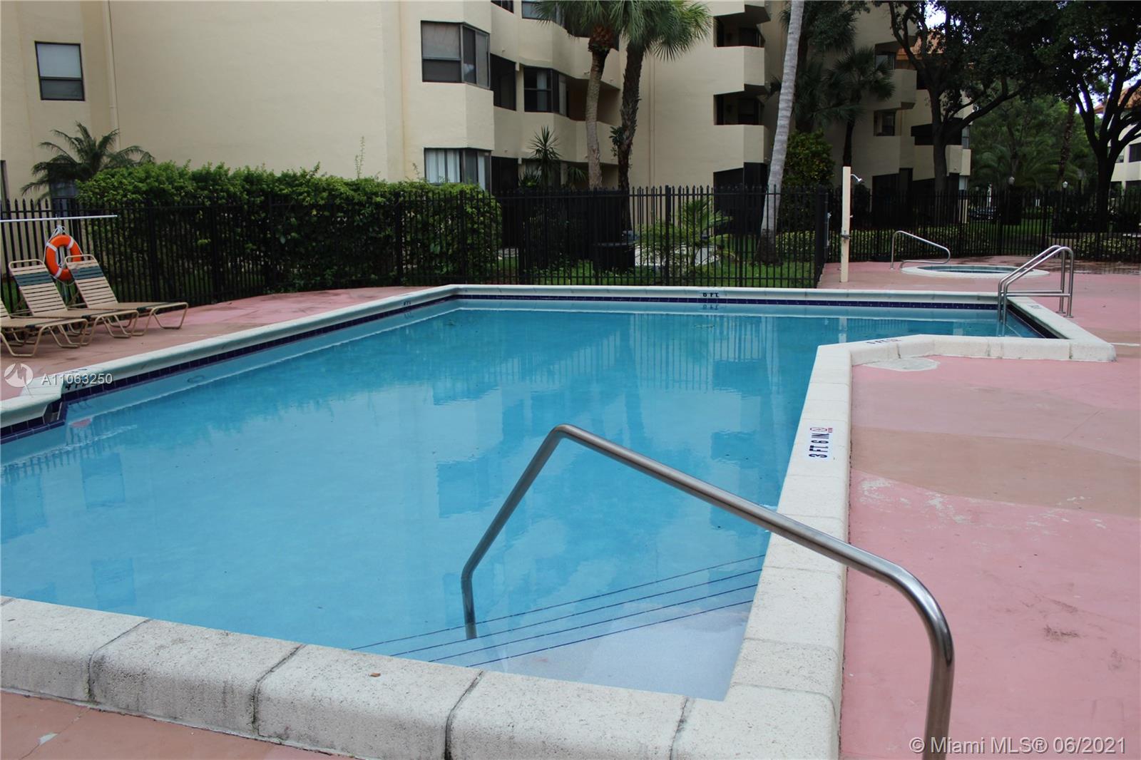 7451 Northwest 16th Street, Unit 210 Plantation, FL 33313 - Photo 15 of 16 a view of swimming pool with patio