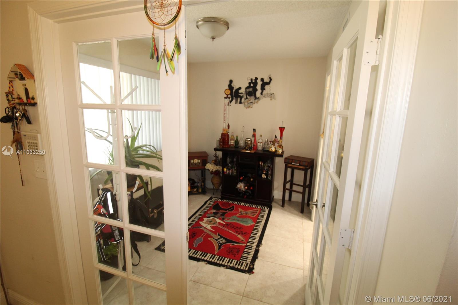 7451 Northwest 16th Street, Unit 210 Plantation, FL 33313 - Photo 10 of 16 a view of kids room with gym equipment