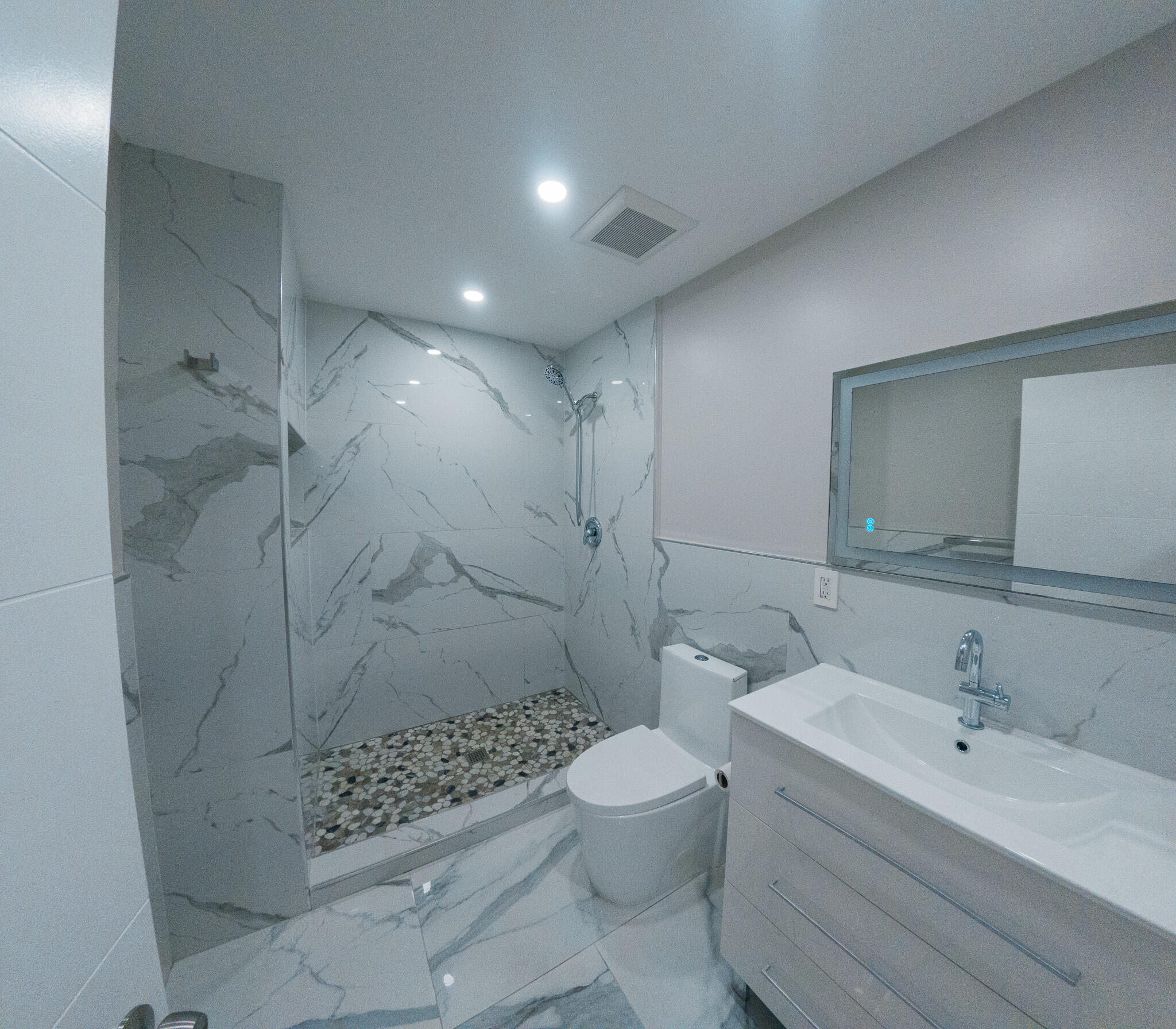 352 Johnston Street Fort Pierce, FL 34982 - Photo 15 of 28 a bathroom with a sink toilet and shower