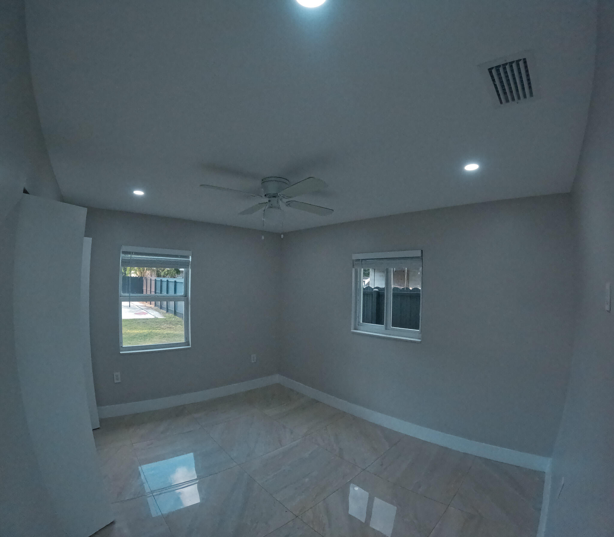 352 Johnston Street Fort Pierce, FL 34982 - Photo 16 of 28 a view of an empty room and window