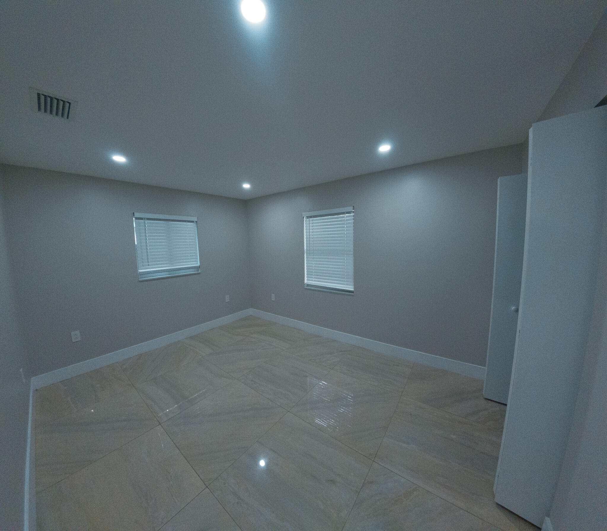 352 Johnston Street Fort Pierce, FL 34982 - Photo 19 of 28 an empty room with a window