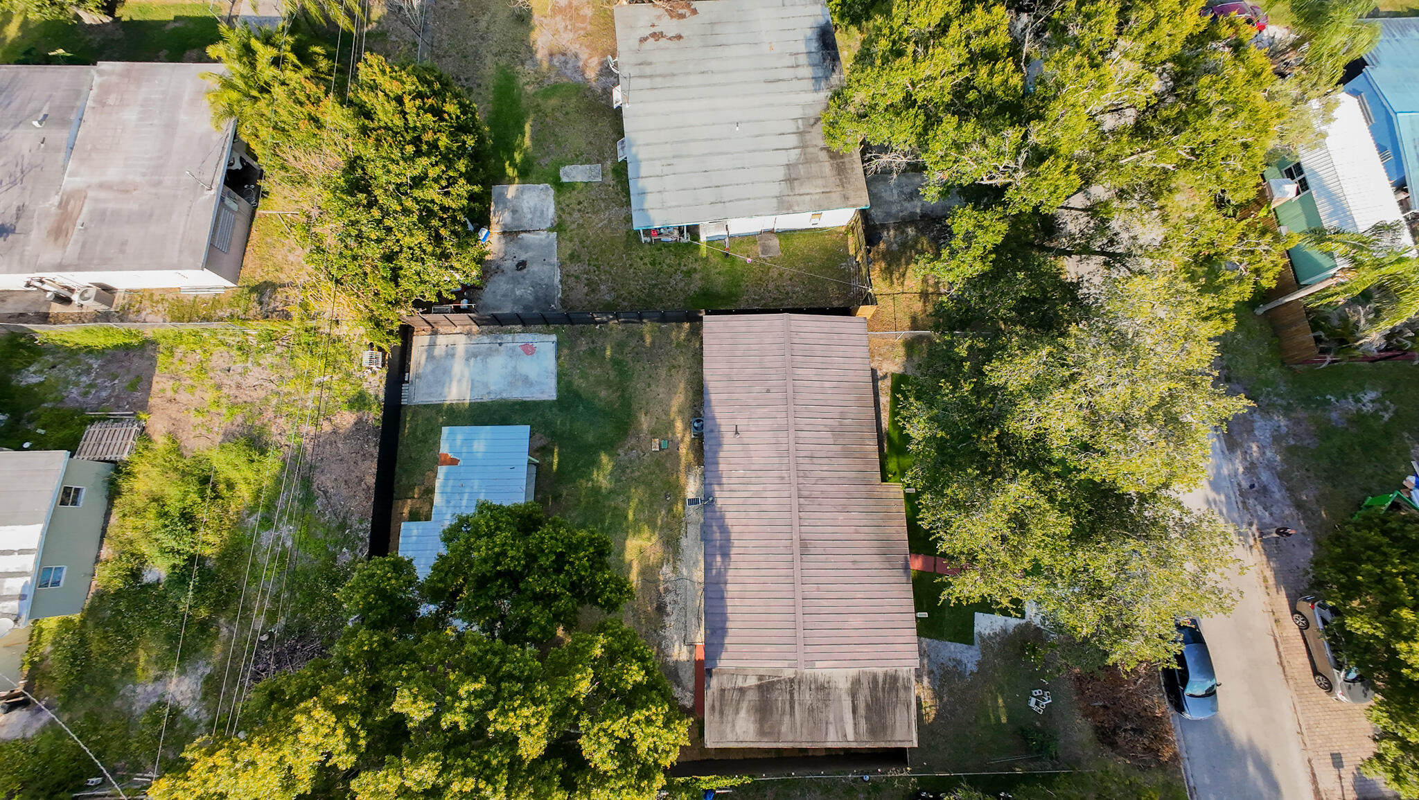 352 Johnston Street Fort Pierce, FL 34982 - Photo 26 of 28 aerial view of a house with a yard