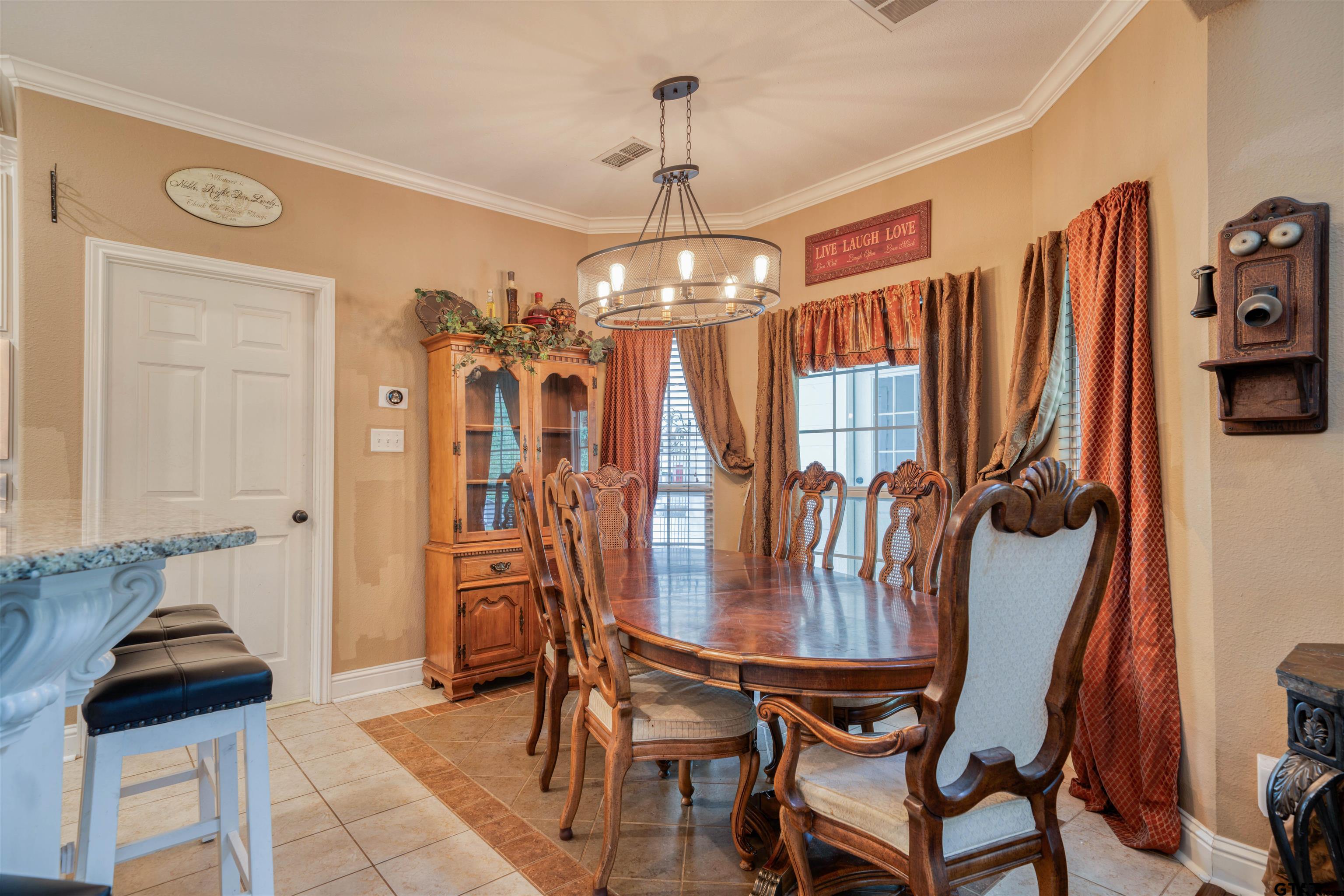 1776 Mustang Road Gilmer, TX 75645 - Photo 24 of 45 a dining room with furniture and window