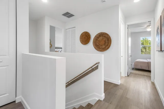 a view of hallway with washer and dryer