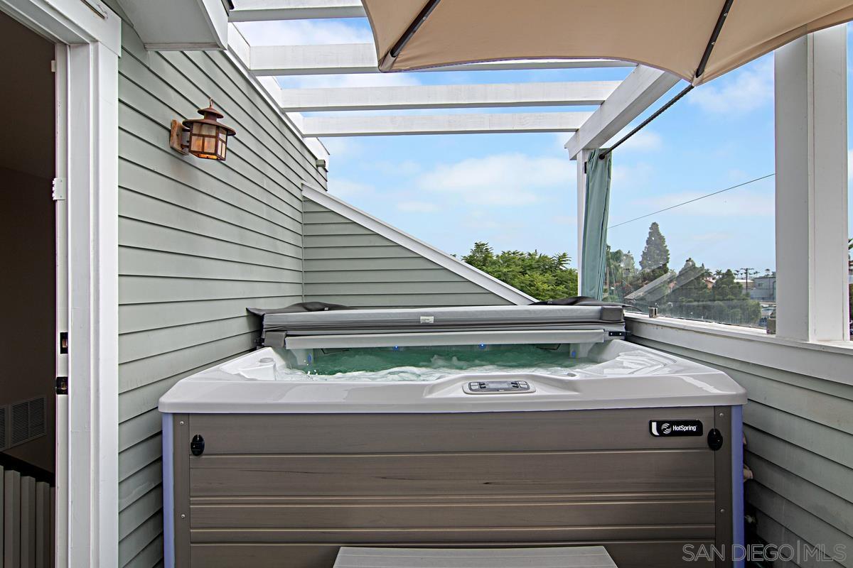 918 D Coronado Ca Coronado, CA 92118 - Photo 26 of 27 a bathroom with a sink and mirror