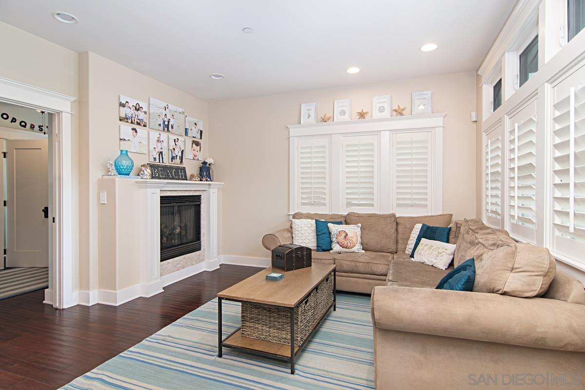 918 D Coronado Ca Coronado, CA 92118 - Photo 4 of 27 a living room with furniture and a fireplace