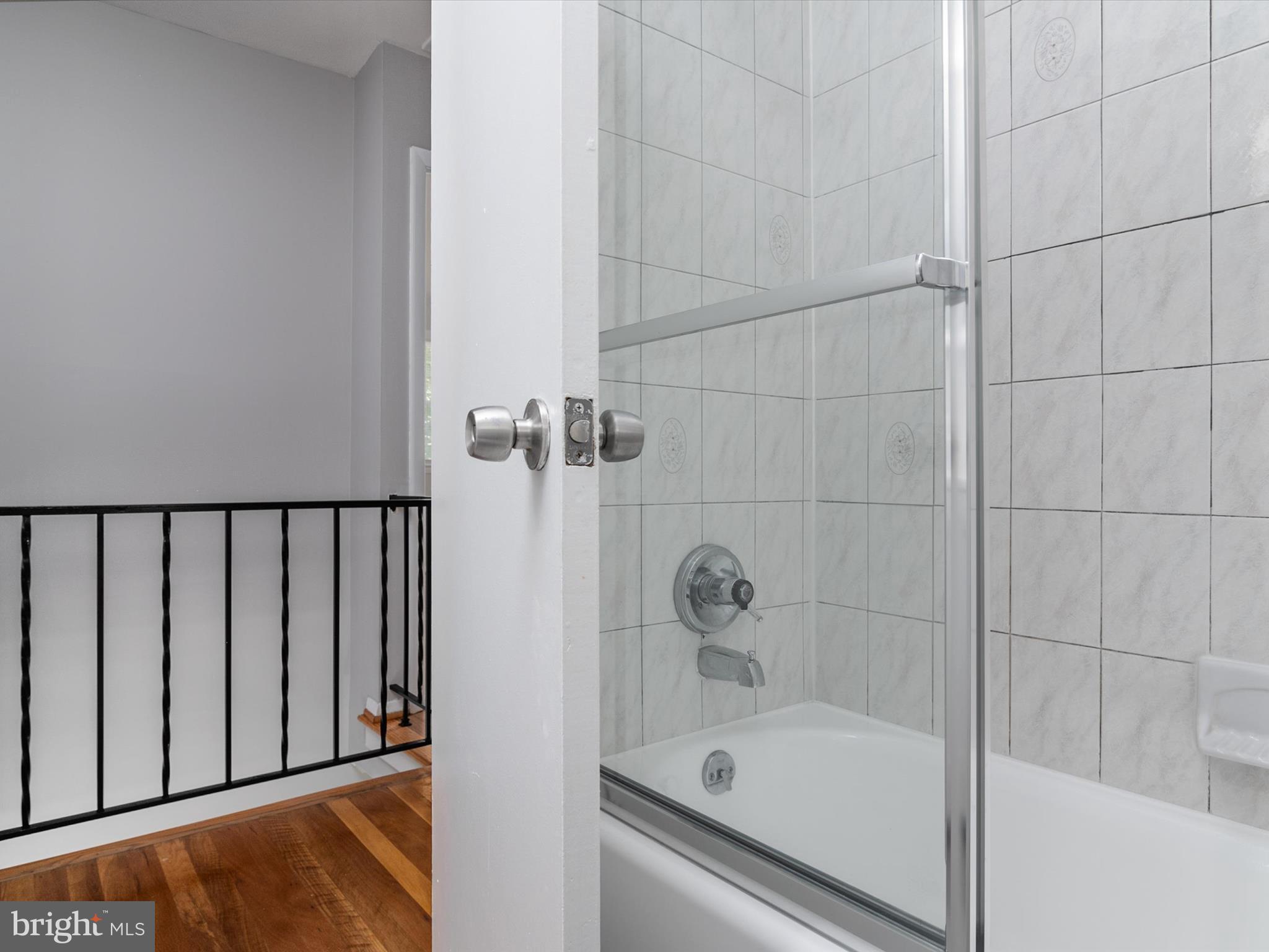 806 Downs Drive Silver Spring, MD 20904 - Photo 22 of 36 a bathroom with a tub and shower