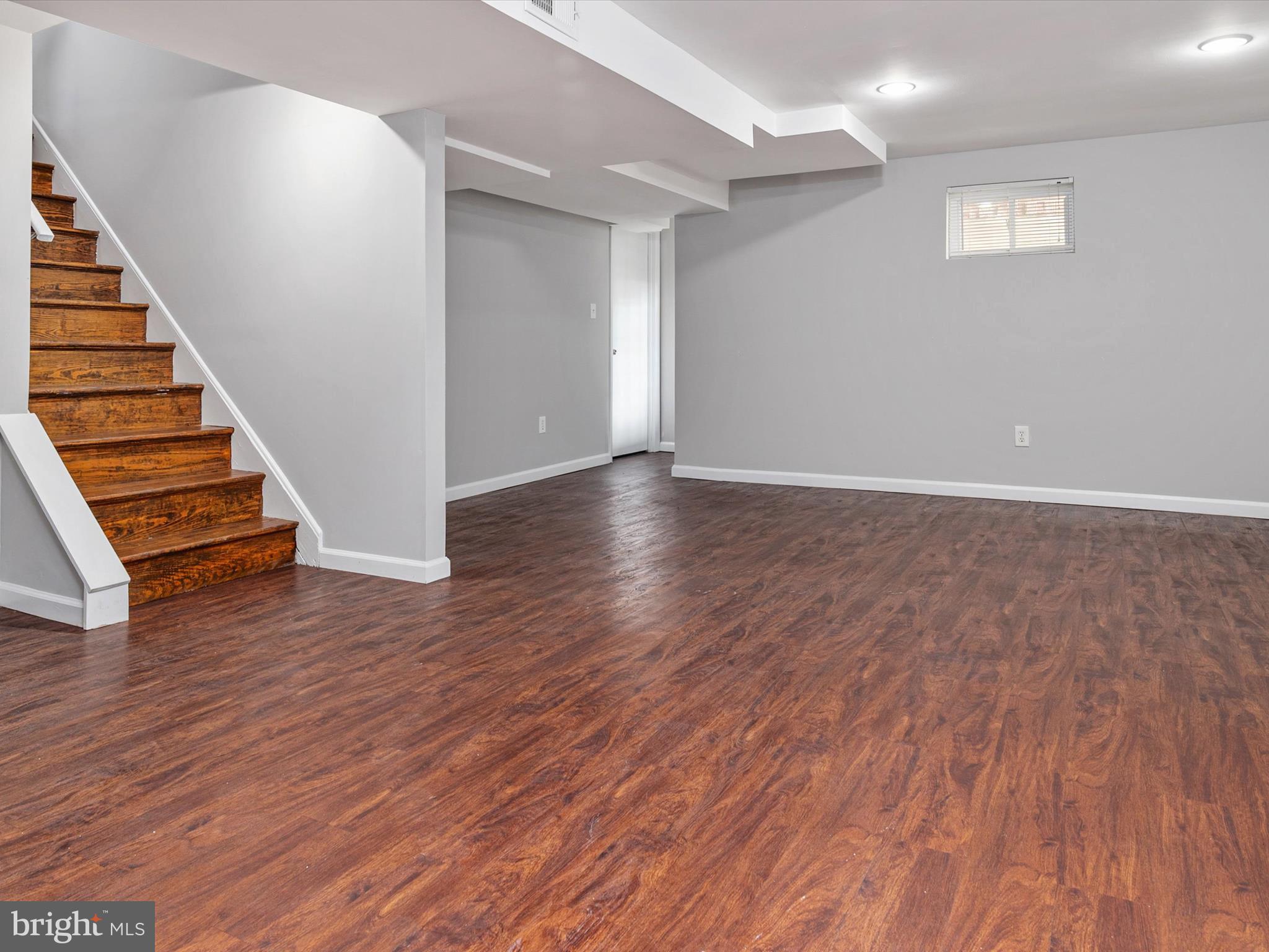 806 Downs Drive Silver Spring, MD 20904 - Photo 29 of 36 wooden floor in an empty room with wooden floor