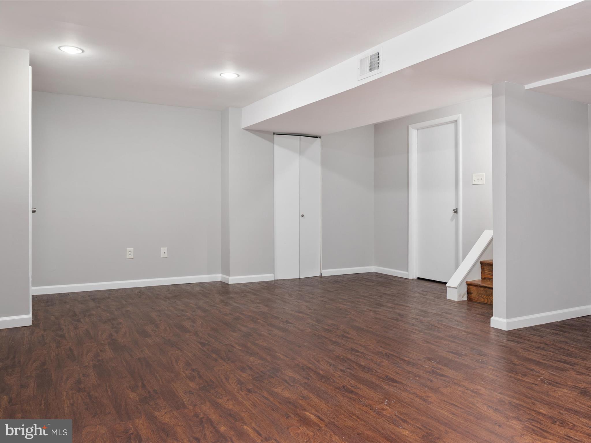 806 Downs Drive Silver Spring, MD 20904 - Photo 30 of 36 a view of an empty room with wooden floor