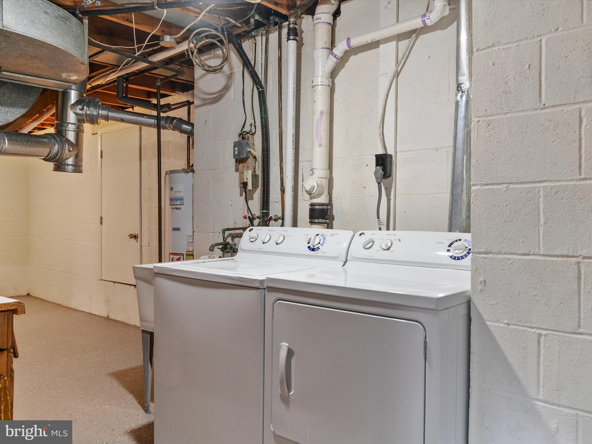 806 Downs Drive Silver Spring, MD 20904 - Photo 31 of 36 a utility room with a washer and dryer