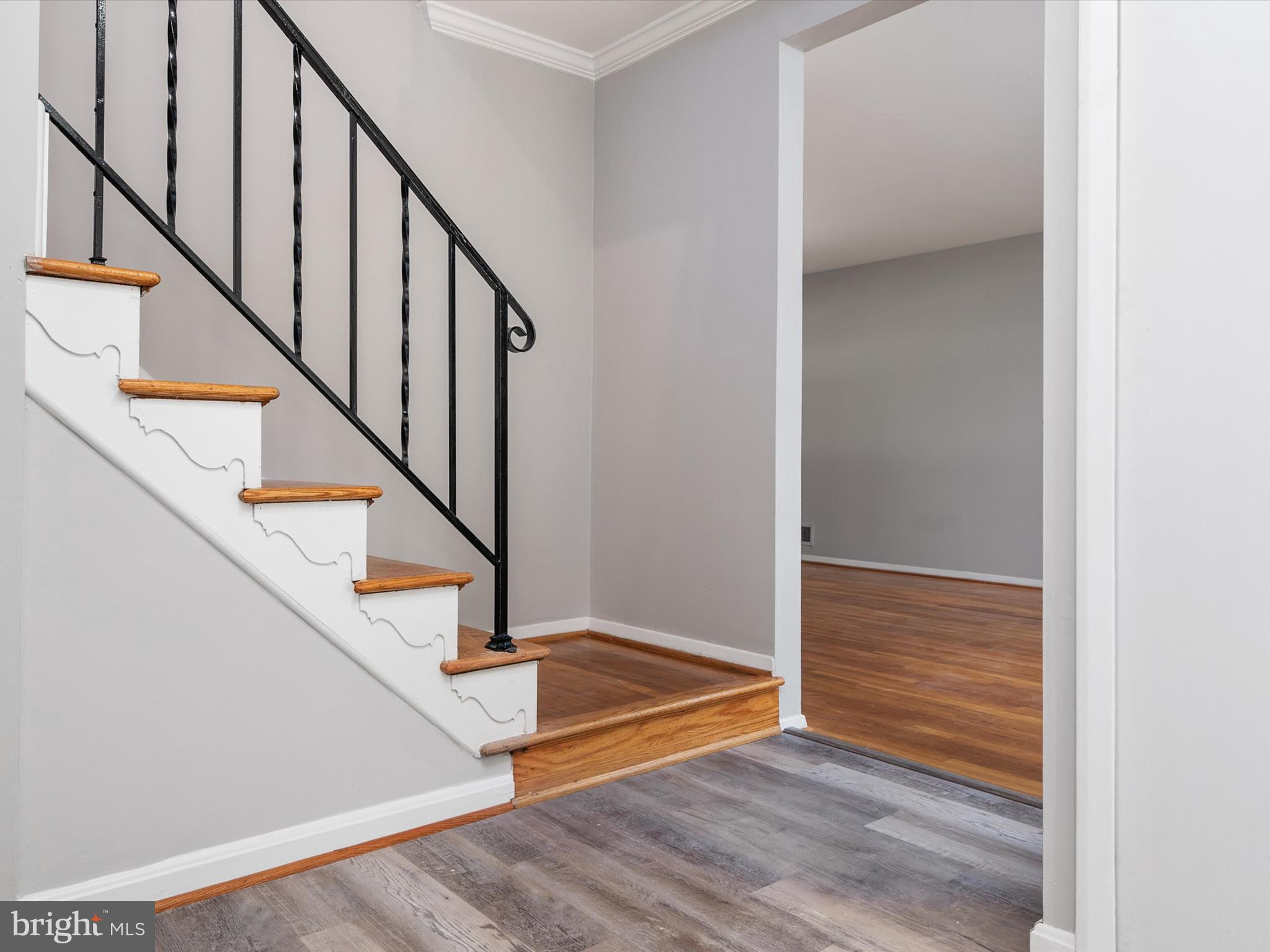 806 Downs Drive Silver Spring, MD 20904 - Photo 7 of 36 a view of entryway and hall with wooden floor